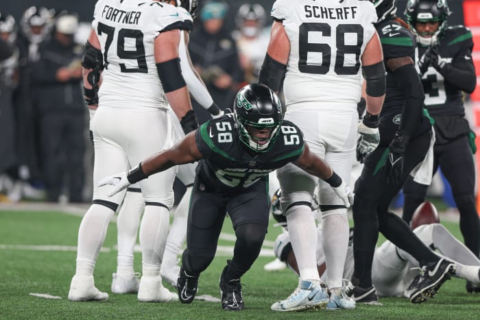Jets edge rusher Carl Lawson celebrates a defensive play against Jacksonville in 2022